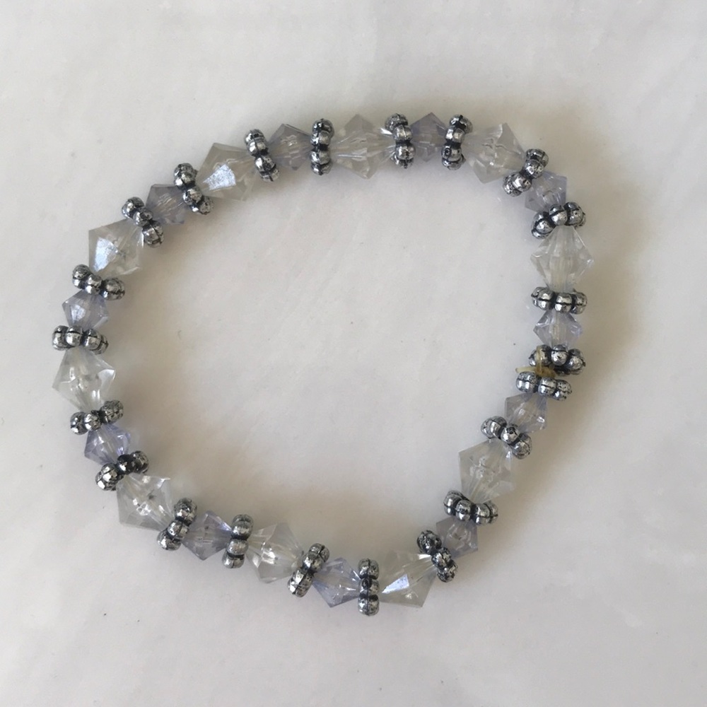 Silver tone and clear bead strategy bracelet